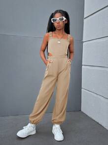 SHEIN Trendy Tween Girl geweven effen kleur jumpsuit met gekruiste rugbanden, mouwloos voor lente/zomer casual streetstyle