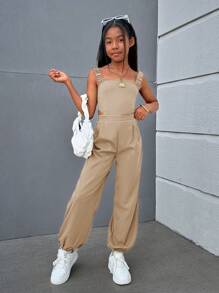 SHEIN Trendy Tween Girl geweven effen kleur jumpsuit met gekruiste rugbanden, mouwloos voor lente/zomer casual streetstyle