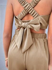 SHEIN Trendy Tween Girl geweven effen kleur jumpsuit met gekruiste rugbanden, mouwloos voor lente/zomer casual streetstyle