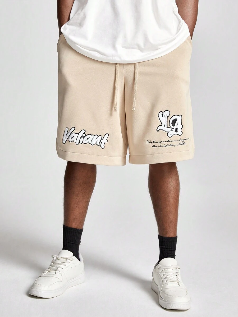 Manfinity RebelGame 男士宽松直筒英文文字印花针织短裤，适合夏季 - 杏色 - 查看 1