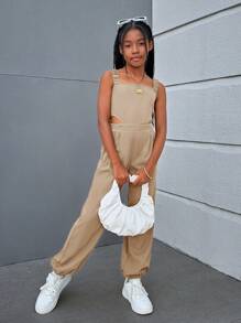 SHEIN Trendy Tween Girl geweven effen kleur jumpsuit met gekruiste rugbanden, mouwloos voor lente/zomer casual streetstyle