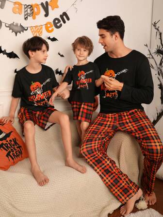 SHEIN Tween Boy Halloween Pumpkin Cartoon Print Short Sleeve Shorts Loose Casual Flame Retardant Pajama Set, Daddy And Me Matching Outfits (3 Sets Sold Separately)
