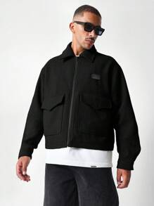 SUMWON Veste d'hiver de style streetwear bomber utilitaire texturée, oversize avec fermeture éclair avant, grandes poches avant. Style décontracté, moderne et urbain