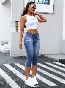 SHEIN Essnce Vaqueros casuales de tela vaquera de corte slim con bolsillos y cinturilla con botones para mujer