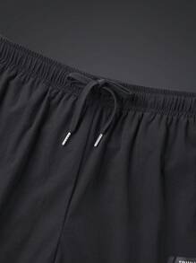 Manfinity Sport Corelite 男友风男士抽绳腰带运动短裤