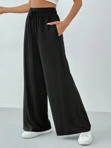Solflare Pantaloni larghi casual in nero, con tasche e vita con cordino, in taglia comoda