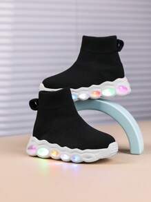 儿童春秋 LED 发光运动鞋，男童中帮纯色一脚蹬鞋，轻便透气柔软弹性鞋面，易于穿脱，适合日常休闲和运动穿着 - 黑色 - 查看 1