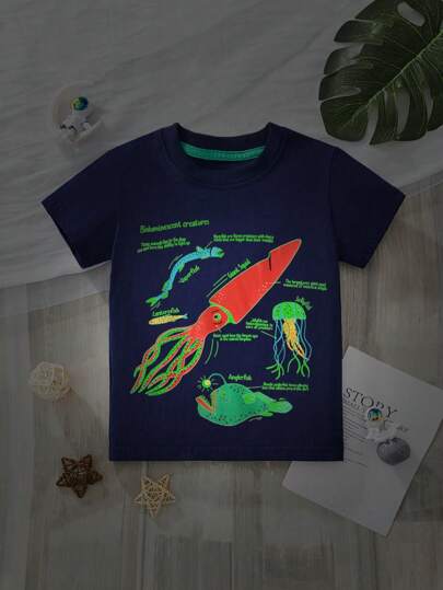 Camiseta informal de manga corta con impresión de eslogan de vida oceánica de dibujos animados que brilla en la oscuridad para niño, moda de verano