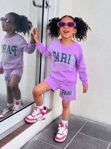 SHEIN Explorewe 女童紫色长袖运动衫和休闲裤套装，这款女童紫色长袖运动衫休闲套装采用清新的紫色色调和时尚的字母印花设计，是女孩日常穿着和活动的理想选择。胸前简洁优雅的字母设计与整体紫色色调相得益彰。配套的短裤也采用相同的清新紫色，营造出统一和谐的外观。整体设计简洁优雅，充满青春活力，适合日常休闲穿着、户外旅行和户外活动，适合秋冬季节。