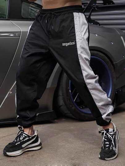 Manfinity Sport Corelite Boyfriend Style Men's Contrast Color Letter Print Drawstring Waist Sports Pants, Tracksuit Sweat-Wicking Lightweight Comfortable Running Muscle Minimalist Design Slim Fit For Workout Gym Wear Sweat Pants