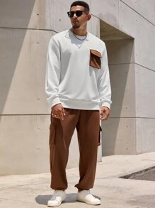 Manfinity Homme 2 piezas Conjunto de ropa de otoño para hombres de talla grande con sudadera de cuello redondo con bloques de color y pantalones de unicolor