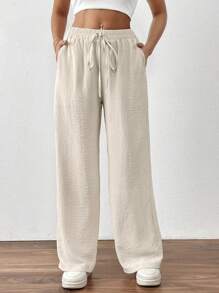 SHEIN PETITE Pantalon décontracté à poche torsadée de couleur unie pour femmes