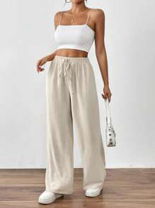 SHEIN PETITE Pantalon décontracté à poche torsadée de couleur unie pour femmes