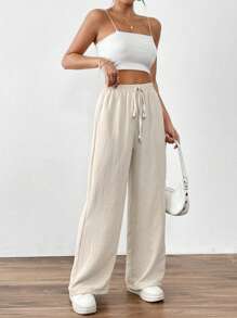 SHEIN PETITE Pantalon décontracté à poche torsadée de couleur unie pour femmes