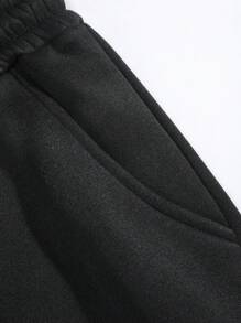 Manfinity Roghcode Men's Loose Solid Color Drawstring Black Sweatpants