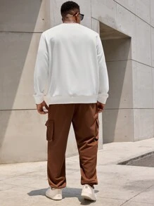 Manfinity Homme 2 piezas Conjunto de ropa de otoño para hombres de talla grande con sudadera de cuello redondo con bloques de color y pantalones de unicolor