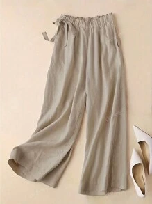 Pantalones anchos casuales y versátiles para mujer con cintura elástica, recogidos, bolsillos diagonales, de unicolor y estilo sencillo, ideales para el otoño