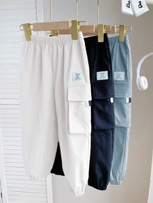 SHEIN 3 piezas/set Pantalones deportivos informales de estilo urbano para niños pequeños con decoración gráfica en inglés y pierna ancha, adecuados para actividades al aire libre, escuela, todas las estaciones - Azul - Ver 7