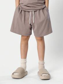SUMWON Conjunto de 2 piezas con camiseta oversize y pantalón corto para niños preadolescentes - Marrón - Ver 4