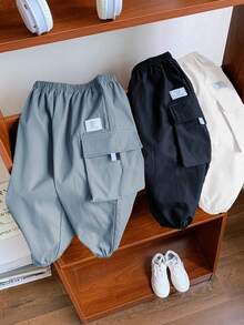 SHEIN 3 piezas/set Pantalones deportivos informales de estilo urbano para niños pequeños con decoración gráfica en inglés y pierna ancha, adecuados para actividades al aire libre, escuela, todas las estaciones - Azul - Ver 5