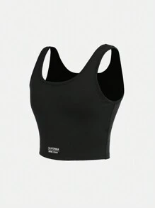 SHEIN Conjunto de ropa deportiva para niña preadolescente con top corto de unicolor y shorts - Negro - Ver 17
