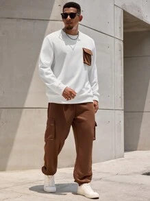 Manfinity Homme 2 piezas Conjunto de ropa de otoño para hombres de talla grande con sudadera de cuello redondo con bloques de color y pantalones de unicolor