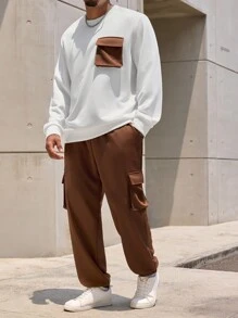 Manfinity Homme 2 piezas Conjunto de ropa de otoño para hombres de talla grande con sudadera de cuello redondo con bloques de color y pantalones de unicolor