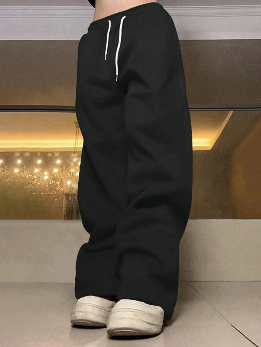 Manfinity Roghcode Men's Loose Solid Color Drawstring Black Sweatpants