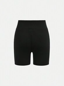 SHEIN Conjunto de ropa deportiva para niña preadolescente con top corto de unicolor y shorts - Negro - Ver 20