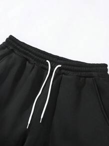 Manfinity Roghcode Men's Loose Solid Color Drawstring Black Sweatpants