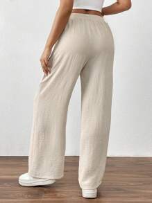 SHEIN PETITE Pantalon décontracté à poche torsadée de couleur unie pour femmes