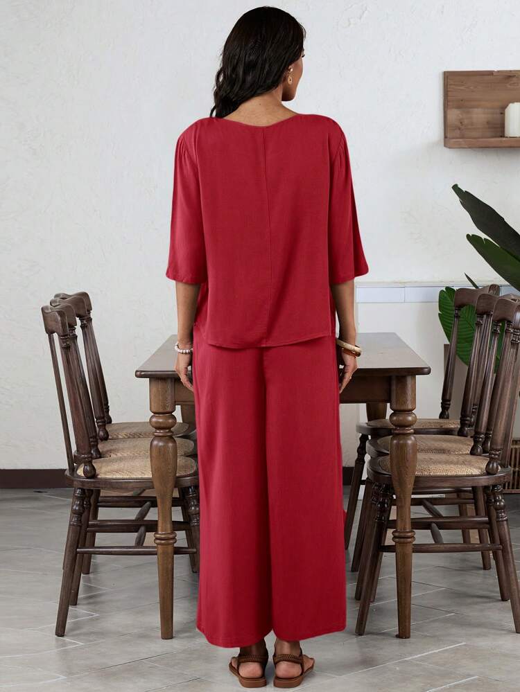 2 piezas/set de pantalones de pierna ancha de unicolor elegante con cuello de tripulación y manga media para mujeres