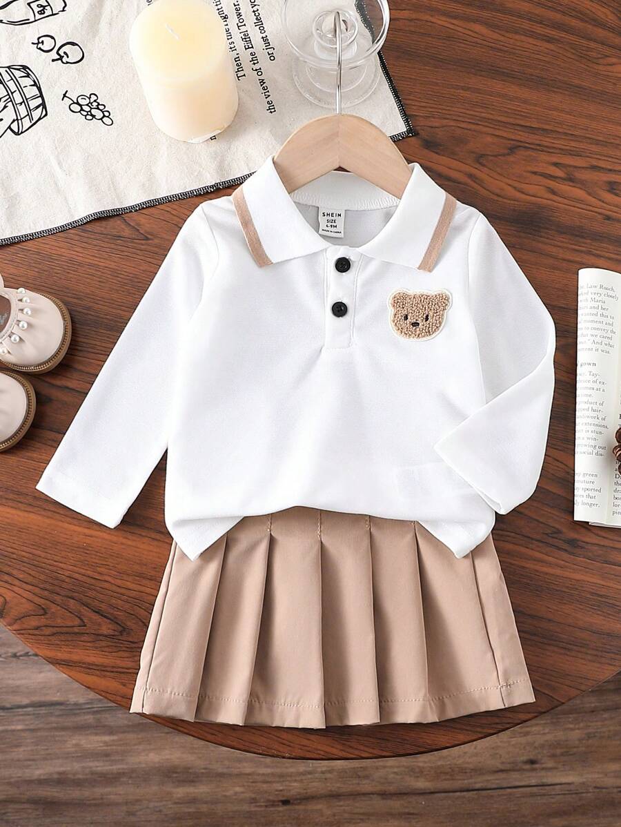 SHEIN Bluzka z misiem dla dziewczynki z długim rękawem i jednokolorową spódnicą - Kolor khaki - Zobacz 1