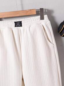 SHEIN 秋冬季 Tween 男童时尚字母图案抽绳休闲运动裤 - 米色 - 查看 6