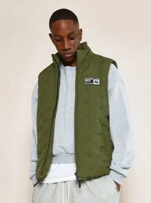 SUMWON Lucky Charm Athletic Varsity Quilted Puffer Vest St. Patrick'S Day College Style Padded Sleeveless Irish-Themed Sports Jacket With Logo For March 17Th Celebrations