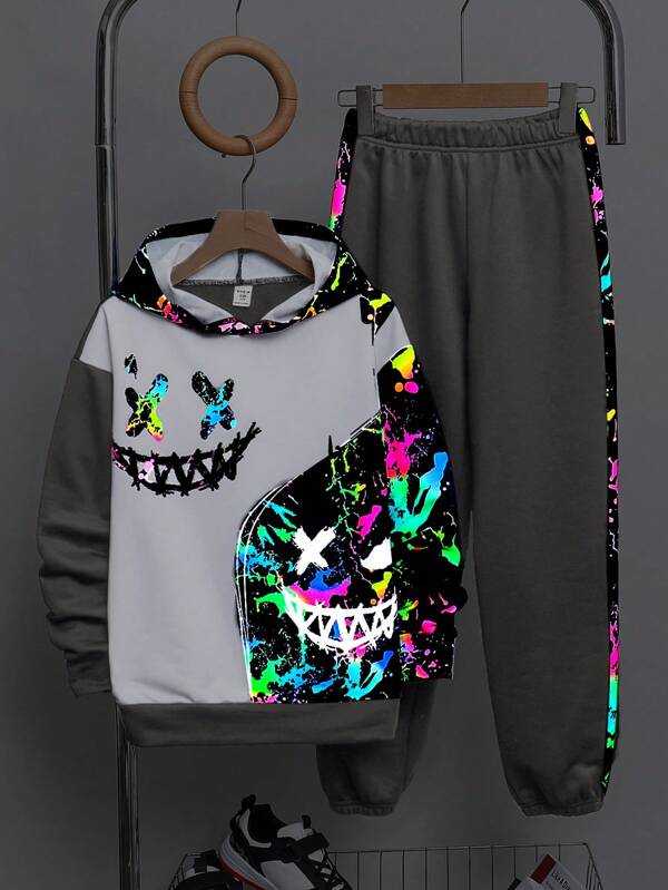 2 piezas Conjunto de sudadera con capucha y pantalones con gráfico que brilla en la oscuridad para niños preadolescentes