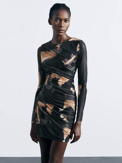 Maija Vestido corto de manga larga, ajustado y sexy con patrón de teñido anudado plisado negro, versátil y de moda, adecuado para el Día de San Patricio, el Festival de Primavera, el Festival de Música, el atuendo de otoño, vestido negro casual