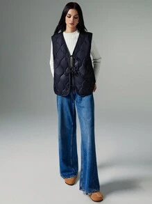 Poéselle Women's Fall/Winter Front Bow-Tie Wool-Lined Quilted Oversized Vest Jacket: A Two-Tone, Thick Sleeveless Outerwear Piece With A Center Bow Tie, Perfect For Outdoor Activities And Autumn Layering, Combining Warmth And Style In A Versatile Design. - Black - View 4