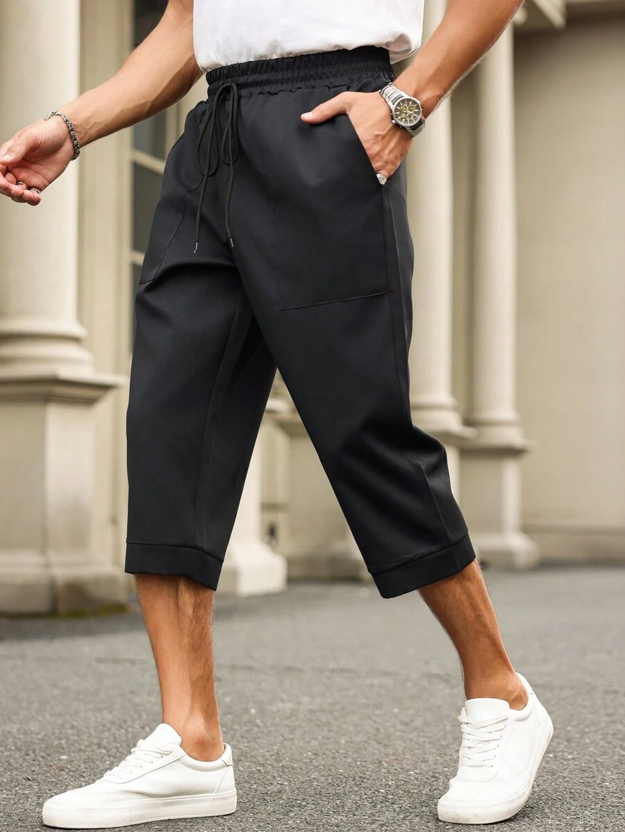 Manfinity Homme 大码男式纯色抽绳腰袋宽松七分裤 - 黑色 - 查看 1