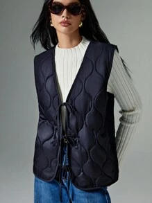 Poéselle Women's Fall/Winter Front Bow-Tie Wool-Lined Quilted Oversized Vest Jacket: A Two-Tone, Thick Sleeveless Outerwear Piece With A Center Bow Tie, Perfect For Outdoor Activities And Autumn Layering, Combining Warmth And Style In A Versatile Design. - Black - View 3