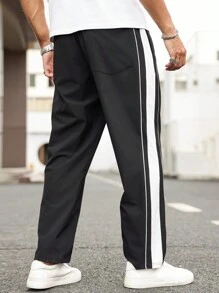 Manfinity Homme Pantaloni casual da uomo oversize con ricamo di lettere, strisce laterali e vita con laccio, con tasche