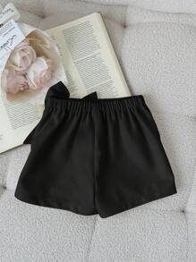 SHEIN Leap Crew Baby Girls Casual Versatile Solid Color Asymmetric Detachable Bow Elastic Waist Black Skirt - Black - View 2