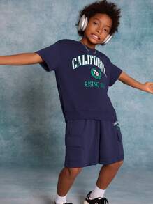 SHEIN Tween Boys' Knitted Solid Color Printed Short Sleeve T-Shirt With Pocket And Drawstring Shorts 2pcs/Set - Navy Blue - View 5
