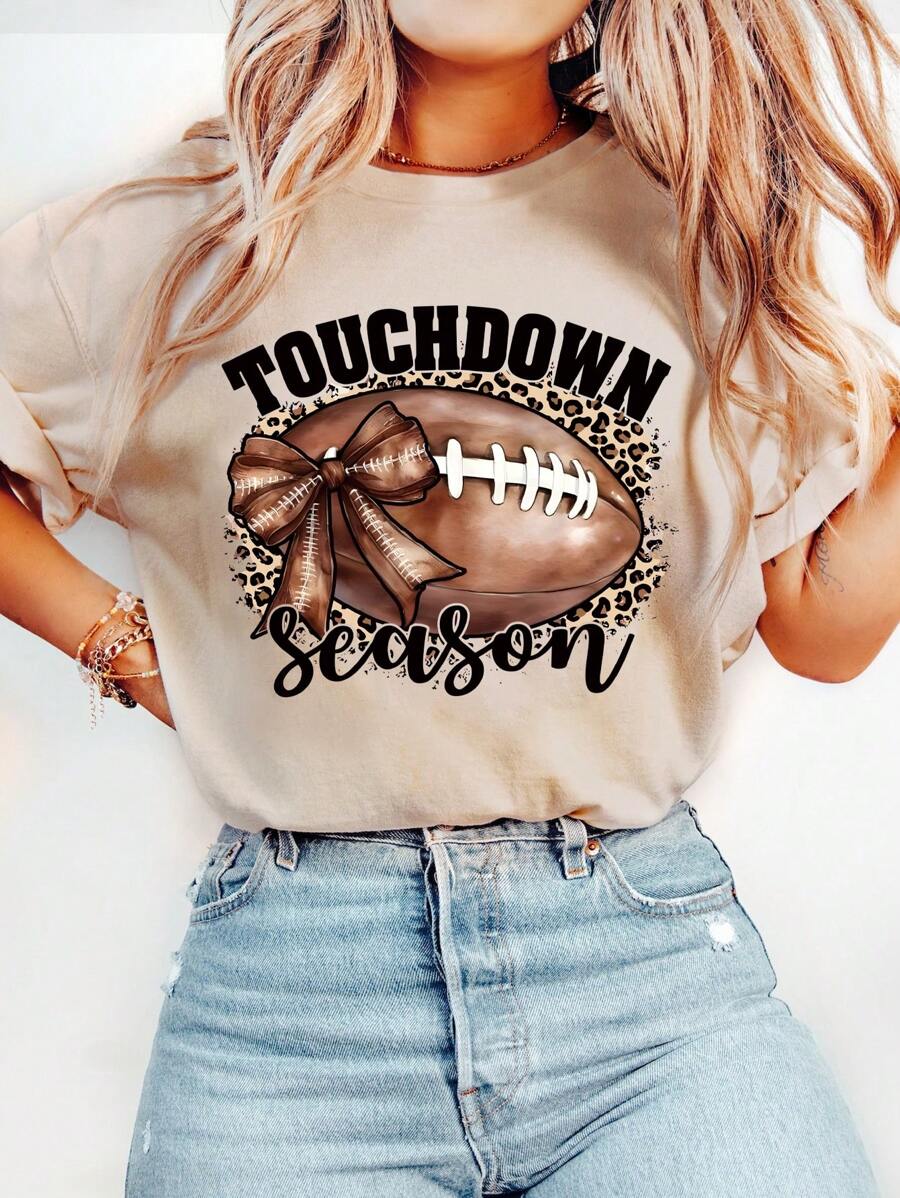 INAWLY Áo thun in hình mùa bóng bầu dục thường ngày dành cho nữ - Màu be - Xem 1