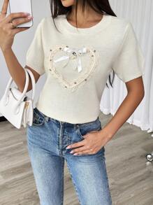 Chiquease Blusa de punto de cuello redondo de manga corta de unicolor con adorno de perlas falsas en forma de corazón, casual para uso diario - Albaricoque - Ver 1
