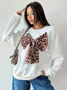 Chiquease Sudadera con cuello redondo, manga larga, decoración de lazo, estampado de leopardo, casual diaria para mujeres