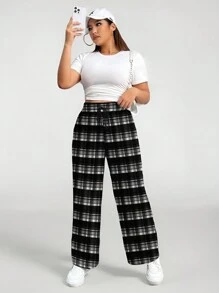 SHEIN EZwear Pantalones sueltos y cálidos de talla grande con estampado a cuadros negro y blanco de estilo casual, aptos para otoño/invierno