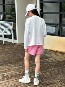 SHEIN Conjunto casual de estilo coreano color rosa para niñas preadolescentes, incluye camiseta sin mangas y pantalones cortos - Rosa - Ver 2