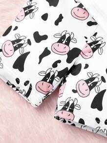 2 piezas Conjunto de pijama con pantalón corto y manga corta con estampado de vaca ajustado para niña joven