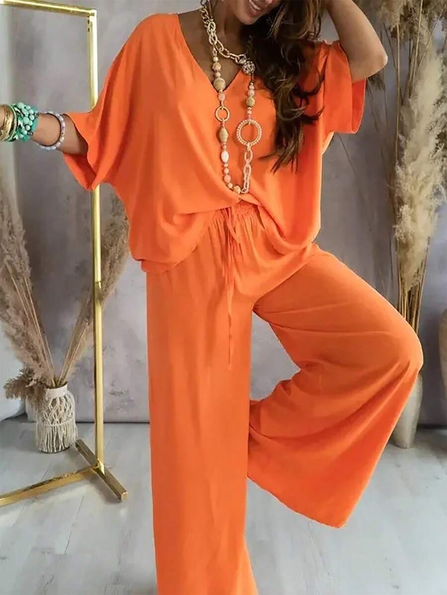 SHEIN Essnce Bộ 2 bộ áo liền quần tay cánh dơi đơn giản đi nghỉ mát cho nữ và quần ống rộng - trái cam - Xem 1